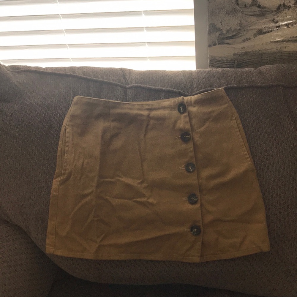 Khaki colored medium sized button up skirt!
